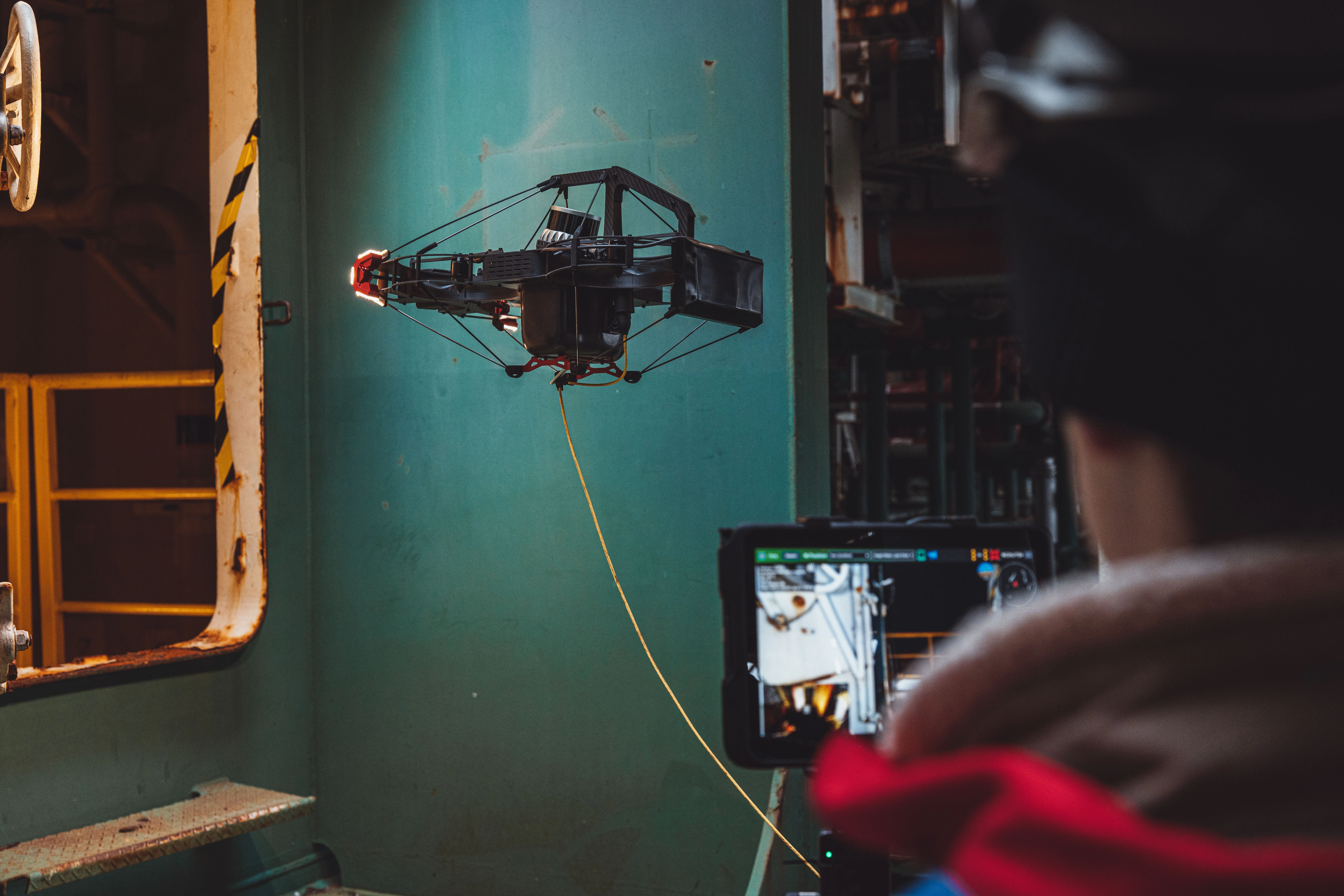 Confined space drone inspection inside industrial storage tank — no personnel entry required